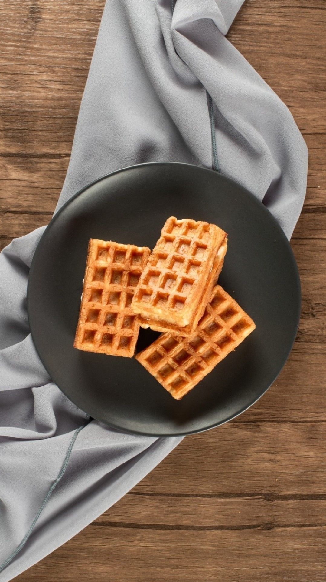 Waffles in a black saucer Malt-Ice-Cream