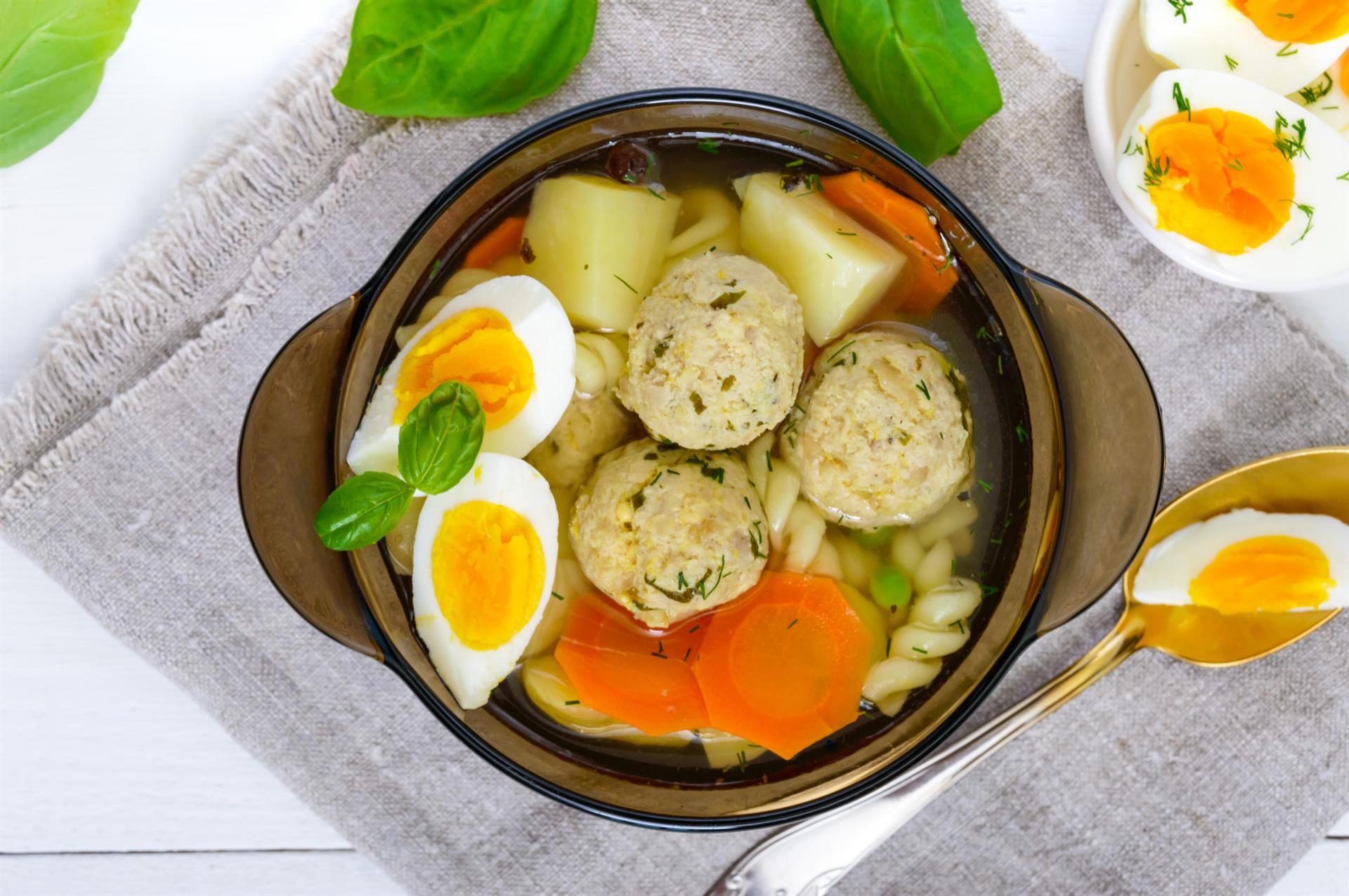 Bowl of soup with chicken meat balls and eggs (Custom) Bowl of soup with chicken meat balls and eggs (Custom)