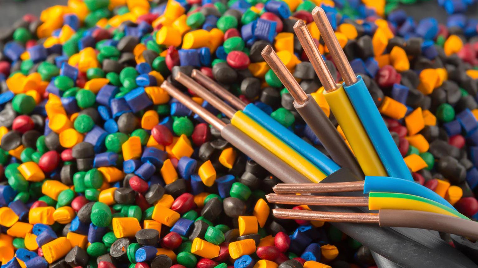 Colorful plastic pellets with electrical wire