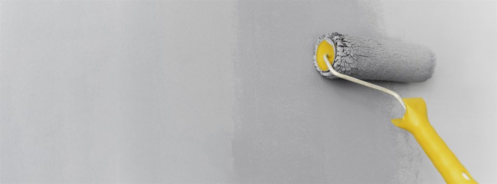 roller-painting-gray-wall-Custom-scaled-1