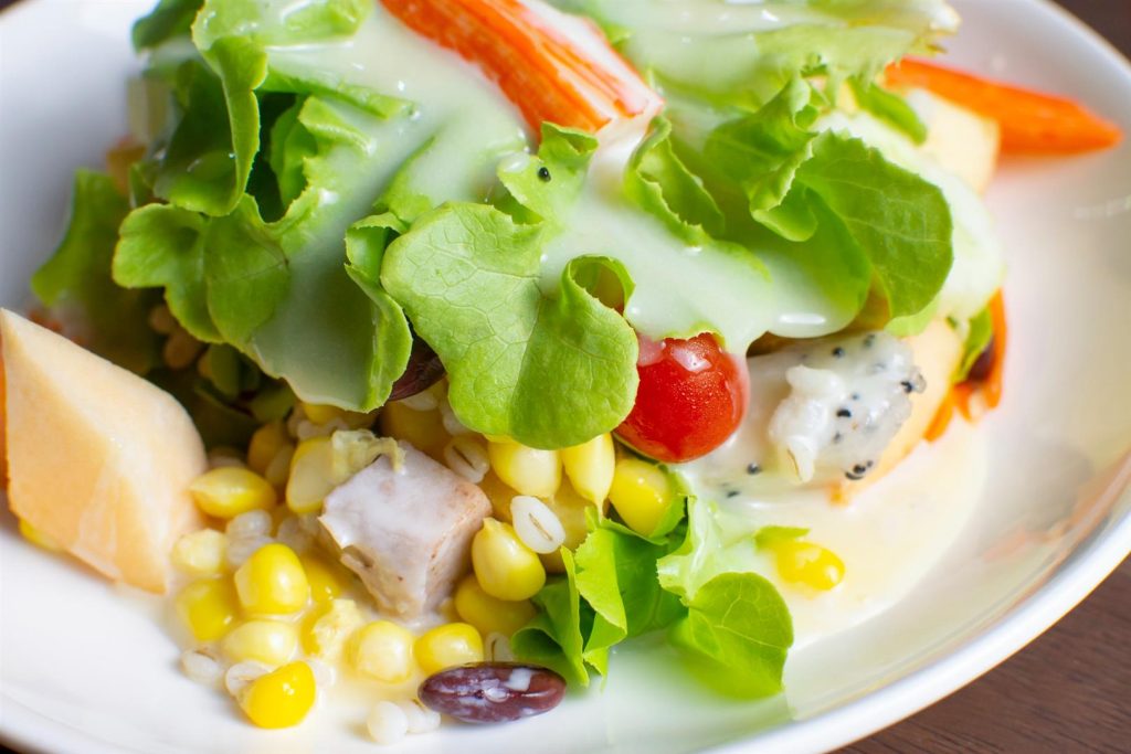 salad-with-fruit-fresh-vegetable-topped-with-salad-dressing-white-dish-wooden-table (Large) salad-with-fruit-fresh-vegetable-topped-with-salad-dressing-white-dish-wooden-table (Large)