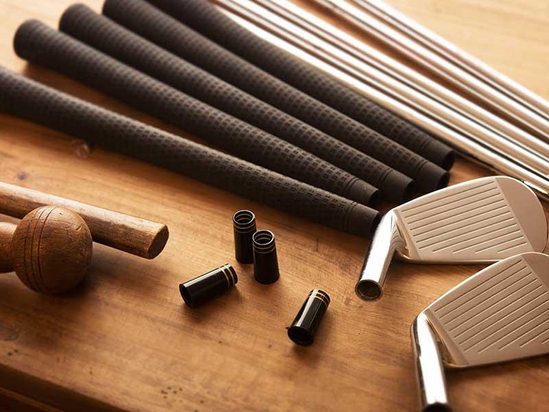 golf clubs and rubber handles