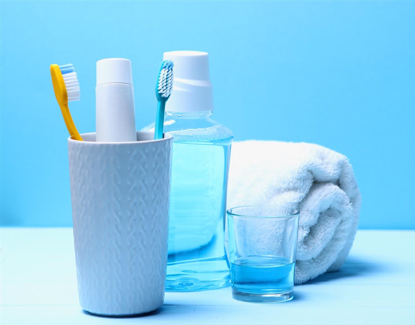 toothbrushes-oral-cleaners-table (Large)2 Sunscreen held in hand at beach